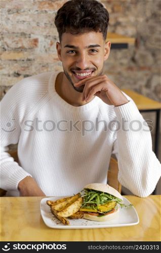 medium shot smiley man with food 2