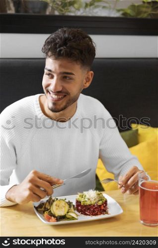 medium shot smiley man with food