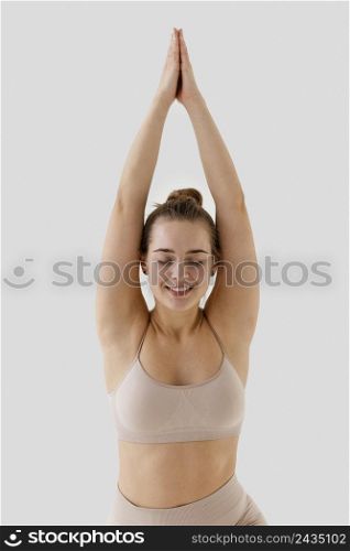 medium shot smiley woman exercising