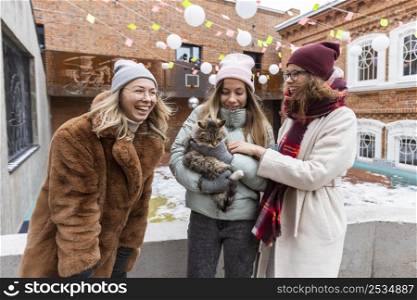 medium shot smiley women with cat