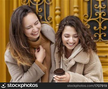 medium shot smiley women with coffee