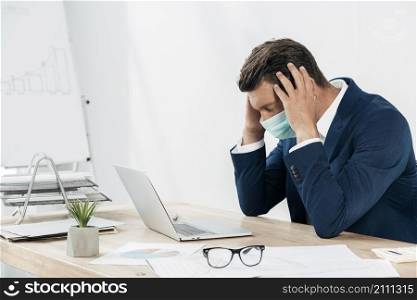 medium shot stressed man with laptop