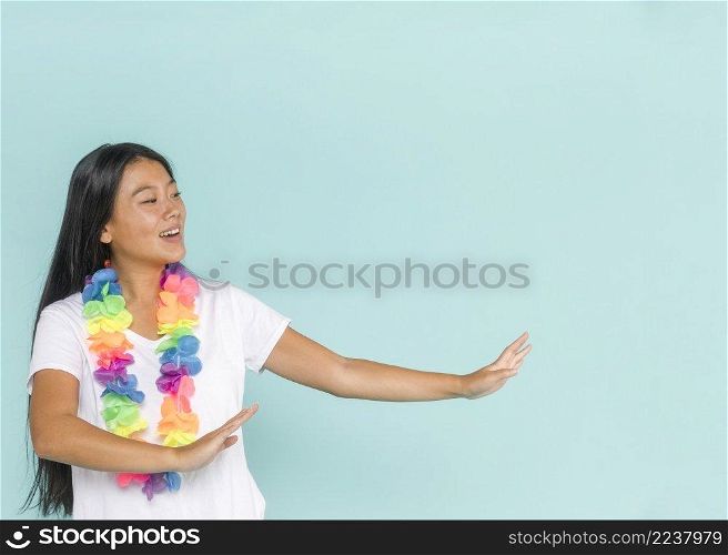 medium shot woman dancing with hawaiian flowers