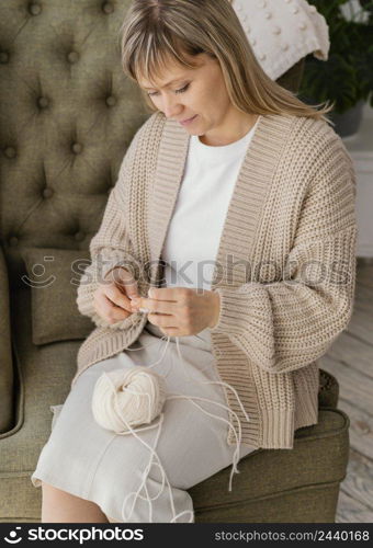 medium shot woman knitting high angle