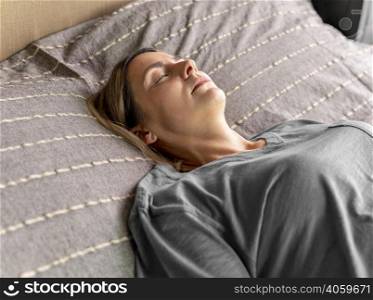 medium shot woman laying bed