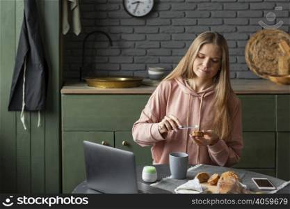 medium shot woman preparing breakfast
