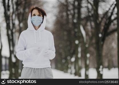 medium shot woman running with masks