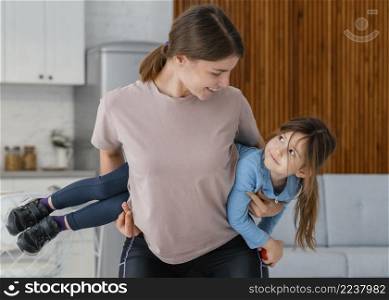 medium shot woman training with kid