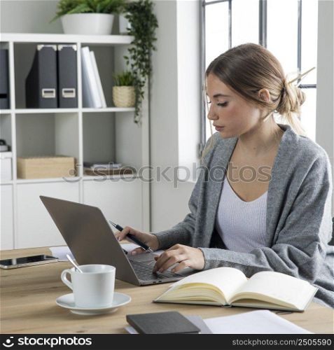 medium shot woman typing keyboard