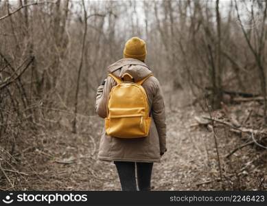 medium shot woman wearing backpack 3. medium shot woman wearing backpack 2