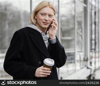 medium shot woman with phone