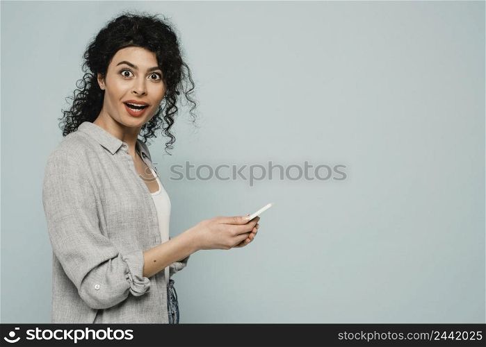 medium shot woman with phone copy space