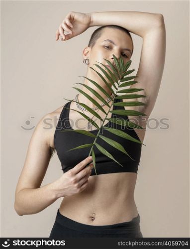 medium shot woman with plant