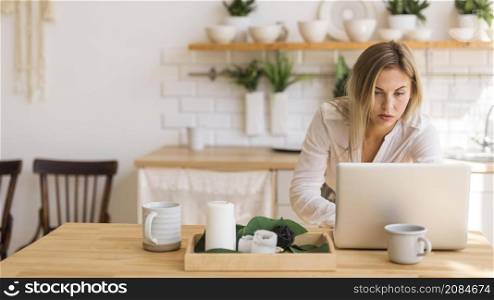 medium shot woman working from home