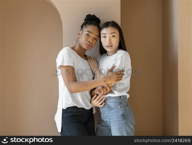 medium shot women holding each other