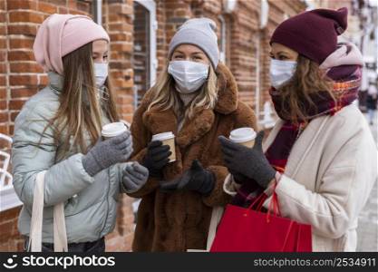 medium shot women wearing medical masks
