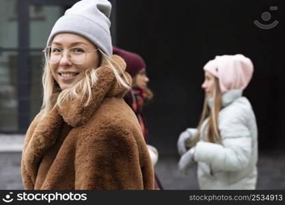 medium shot women wearing warm clothes