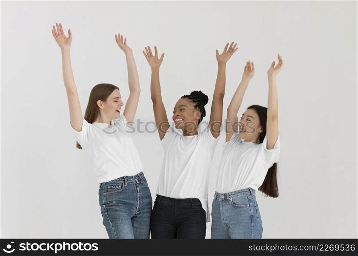 medium shot women with hands up