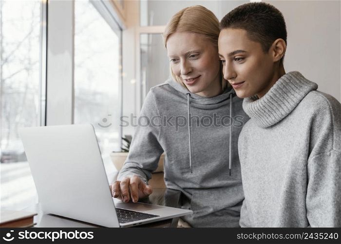 medium shot women with laptop