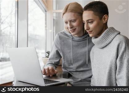 medium shot women with laptop