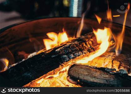 Medium sized bright bonfire with yellow and orange flames