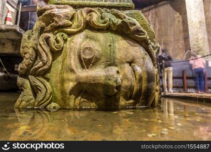 Medusa head in the Basilica Cistern in Istanbul, Turkey in a beautiful summer day