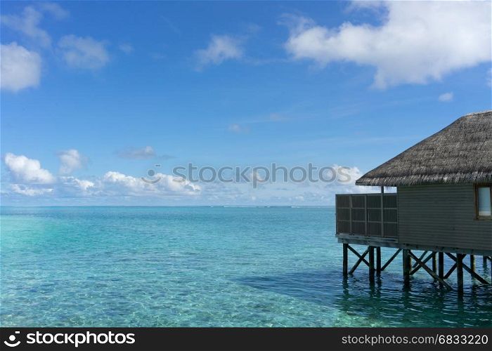 Meeru resort and spa, Maldives - May 8, 2017: Water villas over calm sea in tropical Maldives island