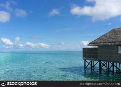 Meeru resort and spa, Maldives - May 8, 2017: Water villas over calm sea in tropical Maldives island