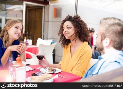 Meeting of friends outside at the coffee shop