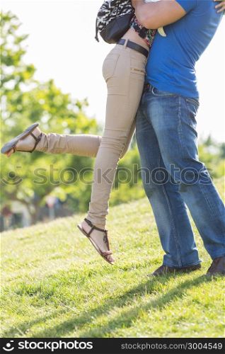 Meeting of two lovers in the park with intense hug
