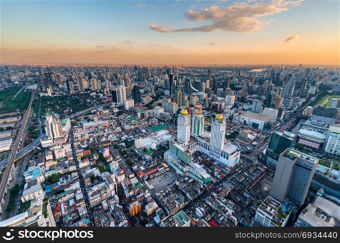 Megapolis during sunset, shooting the city of Bangkok from a tall skyscraper during sunset