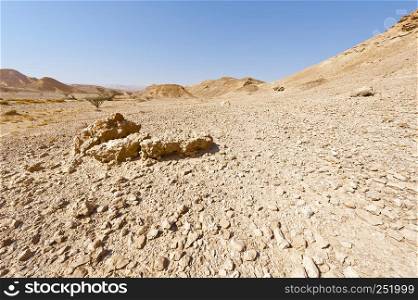 Melancholy and emptiness of the rocky hills of the Negev Desert in Israel. Breathtaking landscape and nature of the Middle East.