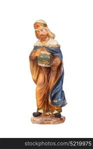 Melchor, one of the three wise men. Ceramic figure isolated on white background