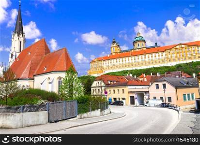 Melk Abbey - Benedictine abbey above the town of Melk, Lower Austria, famous for cruises over Danube river. Landmarks and beautiful places of Austria - Melk town and abbey