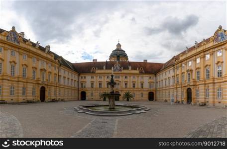 Melk, Auistria - 22 September, 2022: view of the courtyard and fountain at the entrance of Melk Abbey in Lower Austria