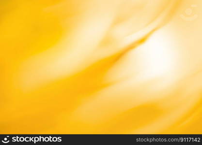 Mellifluent honey color blurred background. Honeyed color sweet bokeh blur out of focus background.. Sunny summer bright golden sweet blurred backdrop