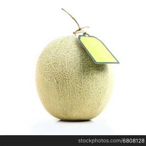 melon with green label tag on white background