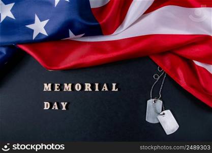 Memorial day concept. American flag and military dog tags on a black background. Remember and honor.. Memorial day concept. American flag and military dog tags on black background. Remember and honor.