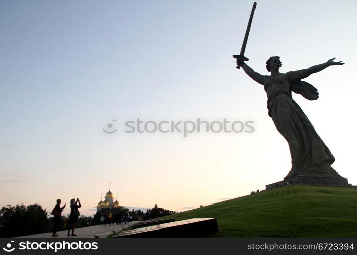 Memorial Motherland with sword and people on the Mamaev kurgan in Volgograd, Russia