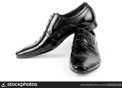 Men&acute;s black leather dress shoes isolated on white