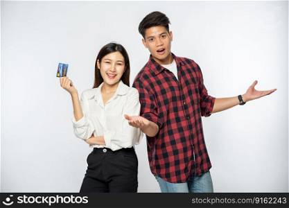 Men and women enjoy using credit cards for shopping.