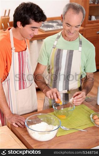 Men baking together