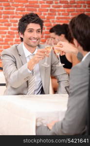 Men drinking champagne