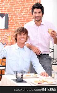 Men drinking champagne in a restaurant