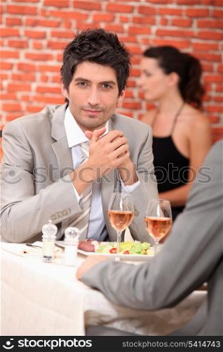Men eating in a restaurant