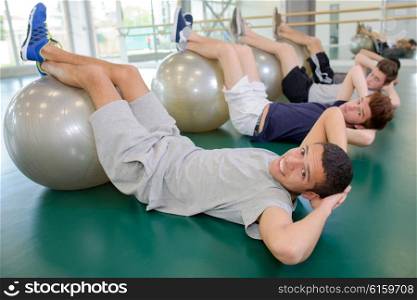 men exercising in the gym
