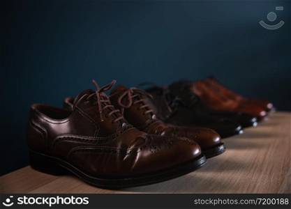 Men Footwear Fashion. Variety of Male&rsquo;s Shoes on Shelf in House. Formal Leather Shoes, included Wingtip, Loafer and Oxford