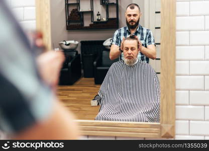 Men in barbershop hair care service