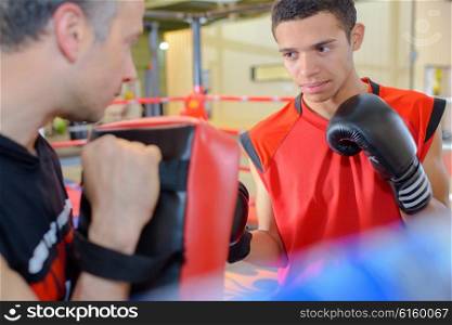 men in the boxing ring