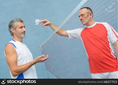 men playing badminton